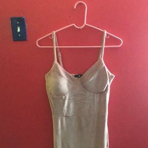 Pink dress, down to knee with slit to mid thigh